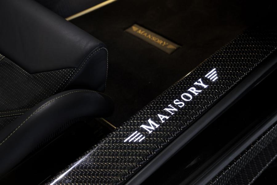 Логотип Aston Martin DB9 Cyrus by Mansory 2009 года  (фото 3 из 34)